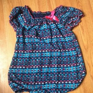 Kids top size 10-12 ruffle top.